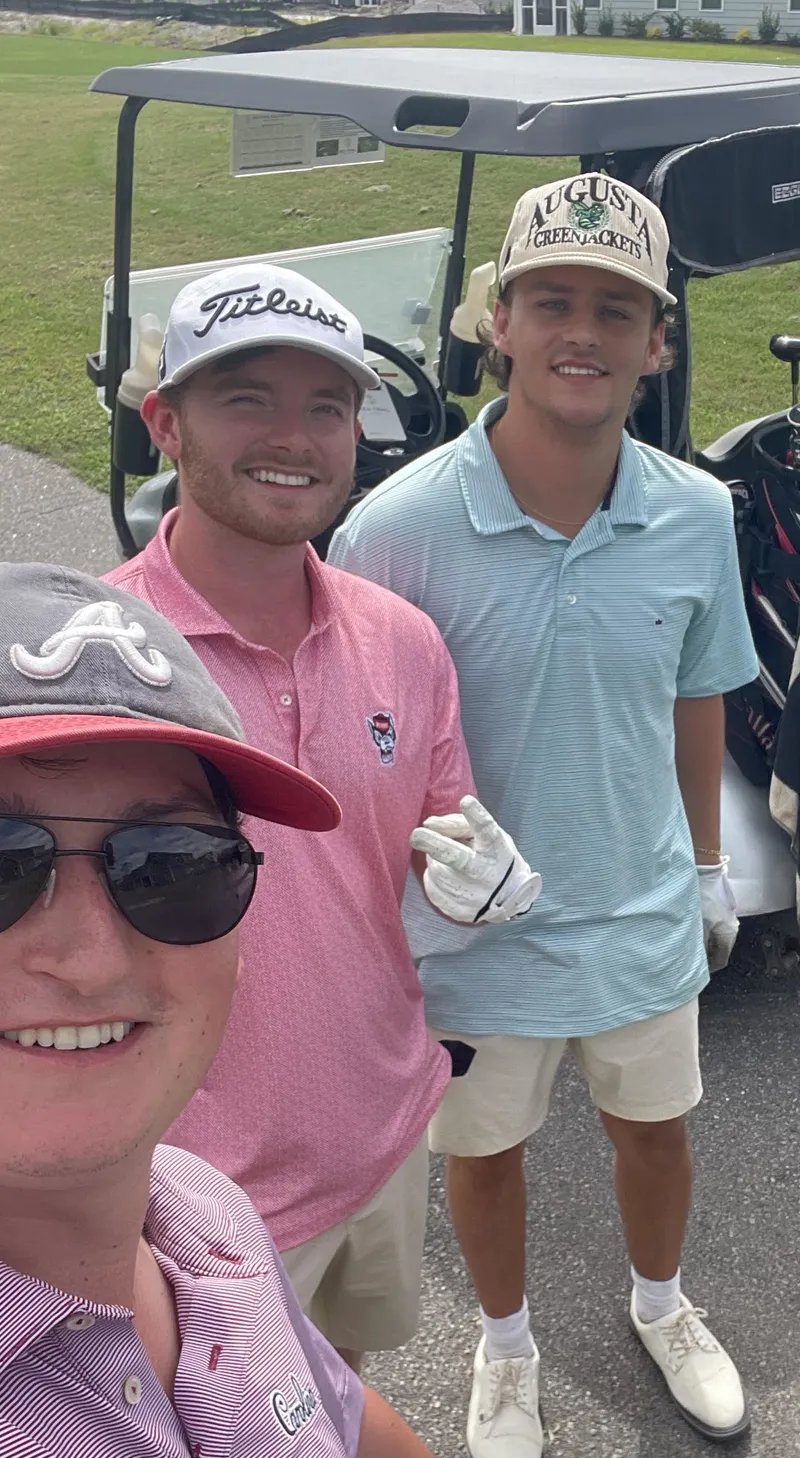 Noah golfing with friends on the North Carolina coast